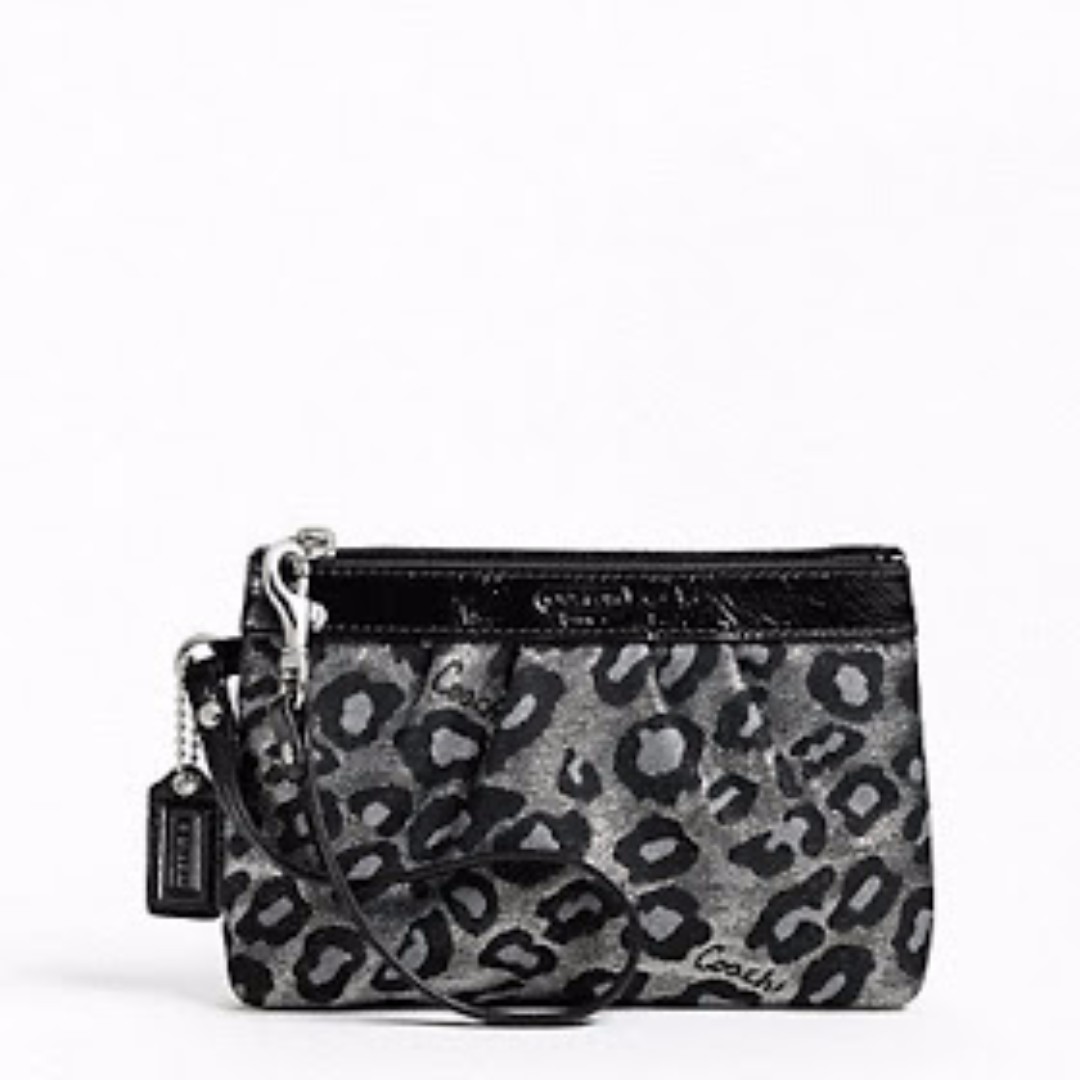 Coach ocelot sale wristlet