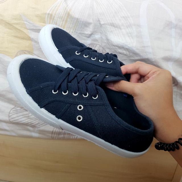 dark blue canvas shoes
