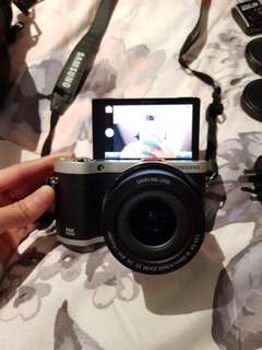Samsung NX300M Digital Camera and 50-200 Lense  + Free Sony Headphones and Camera bag
