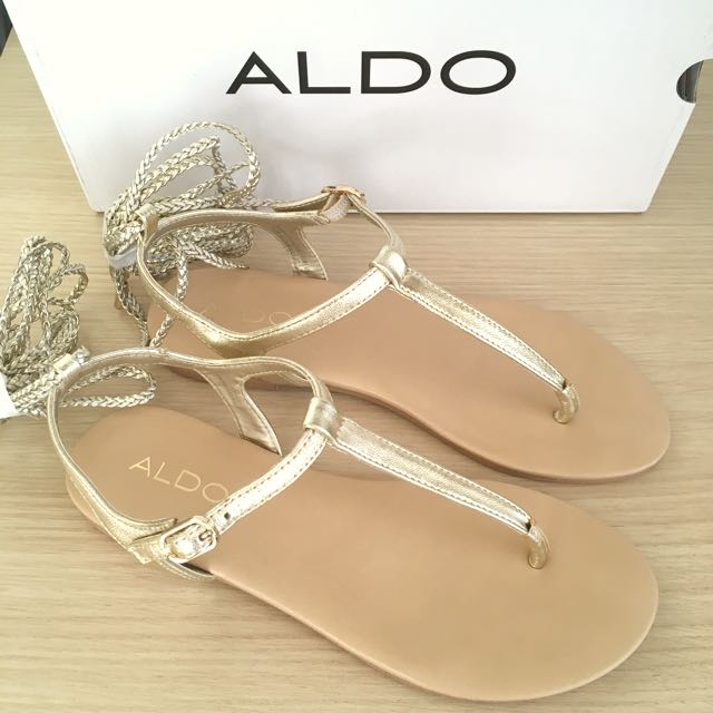 aldo gold flip flops
