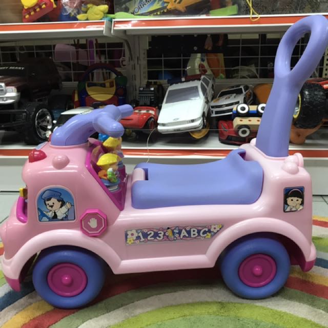Fisher price school store bus ride on