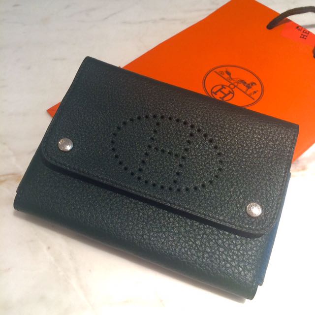 Authentic Hermes Multipurpose Wallet Passport Card Holder Phone Pouch Case (Category: Luxury Bags & Wallets) located in San Juan City. Submitted by akioza (Listing ID 109632294, Image 3). Description: Edit - - - Flying out to migrate in a weeks time. If we don't catch each other I'll need a friend to open my stuff in condo just to collect this if ev. So no time wasters PLS. Fits passports & mobile phone Etc. Paperbag included, looks more orange d
