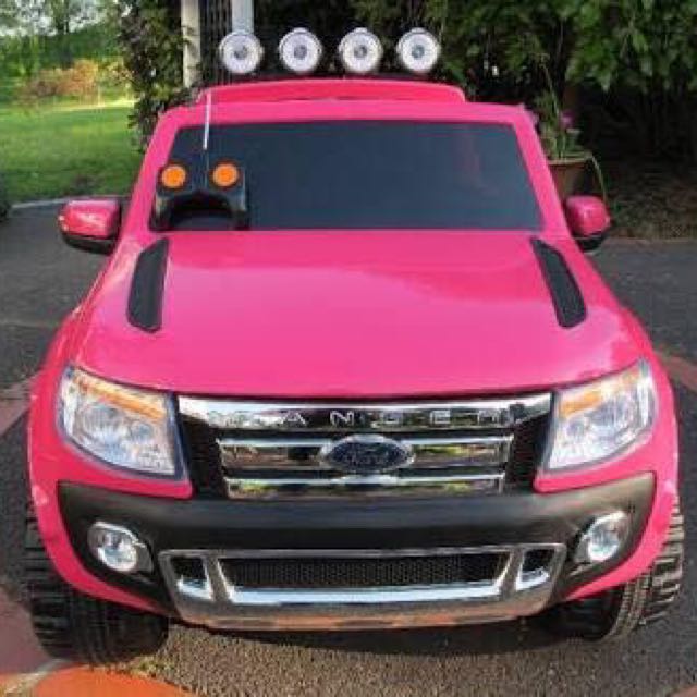 Pink ford ranger 2024 ride on car