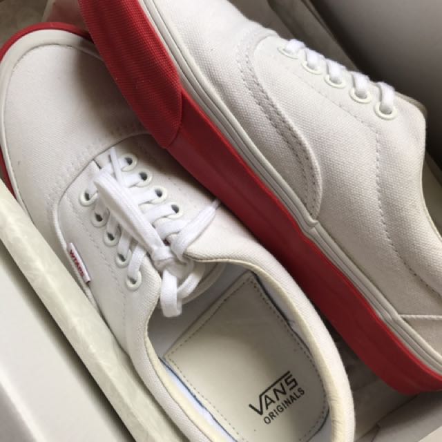 all white vans with red sole