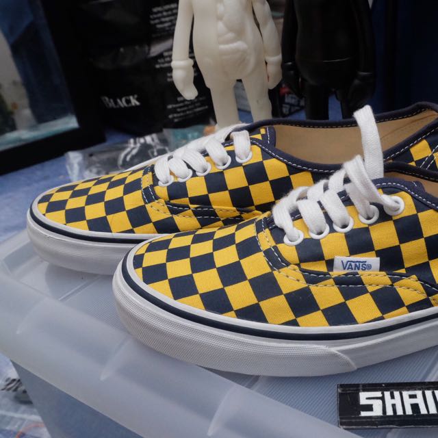 navy blue and yellow vans