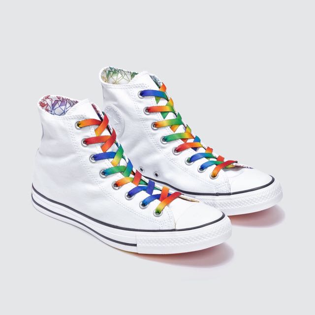 white sneakers with rainbow laces