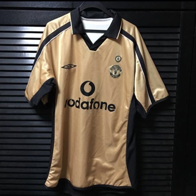 man utd gold shirt