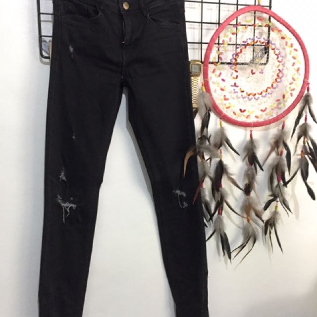 ripped black trousers