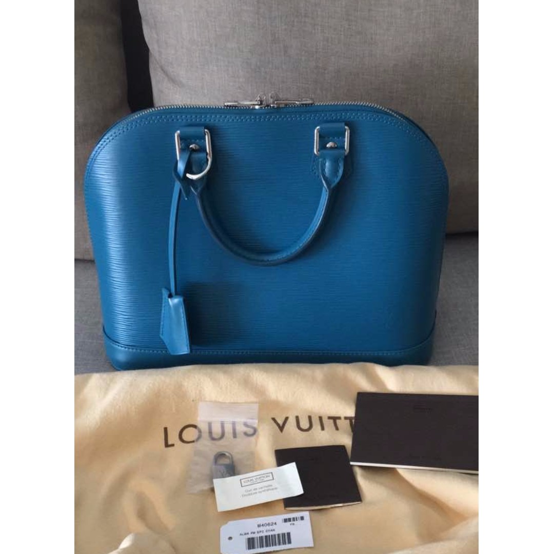 Louis Vuitton Cyan Epi Leather Zippy Wallet Louis Vuitton