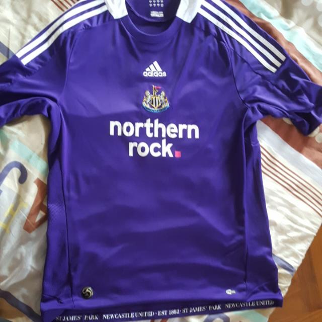 purple newcastle away kit