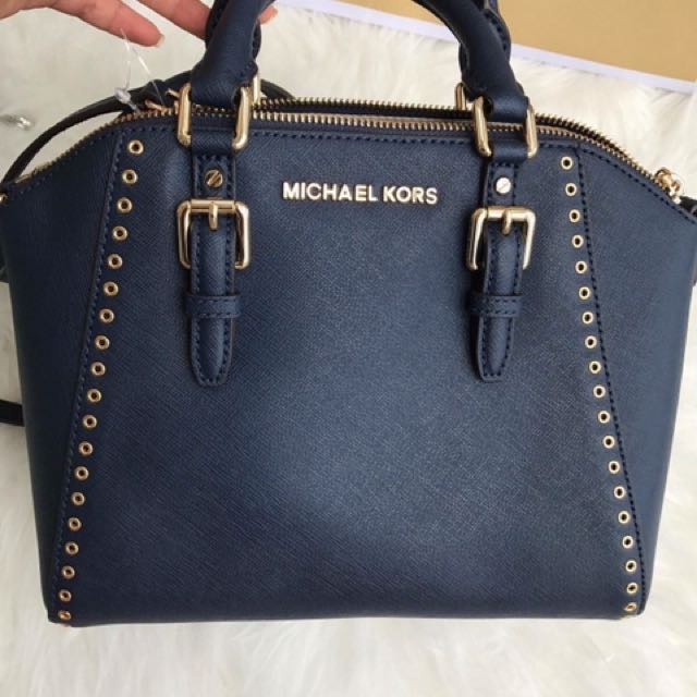 Michael Kors Ciara Grommet Medium Messenger Crossbody Navy Blue, Luxury,  Bags & Wallets on Carousell
