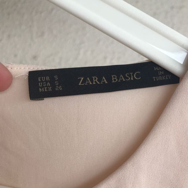 Zara Basic Top (Category: Blouses) located in Kuala Lumpur. Submitted by cluttercutter (Listing ID 115310722, Image 2). Description: .