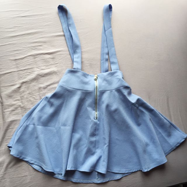 Blue skirt deals with suspenders