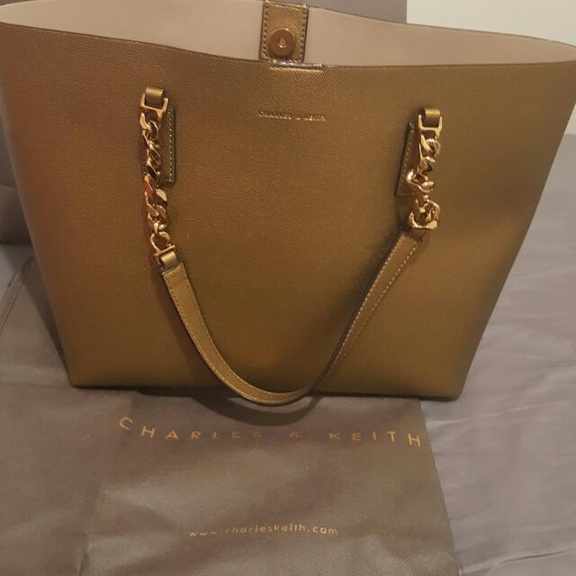 Charles & Keith Gold Handbag, Women's Fashion, Bags & Wallets on Carousell