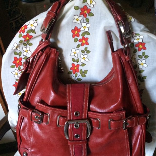 kathy van zeeland red purse