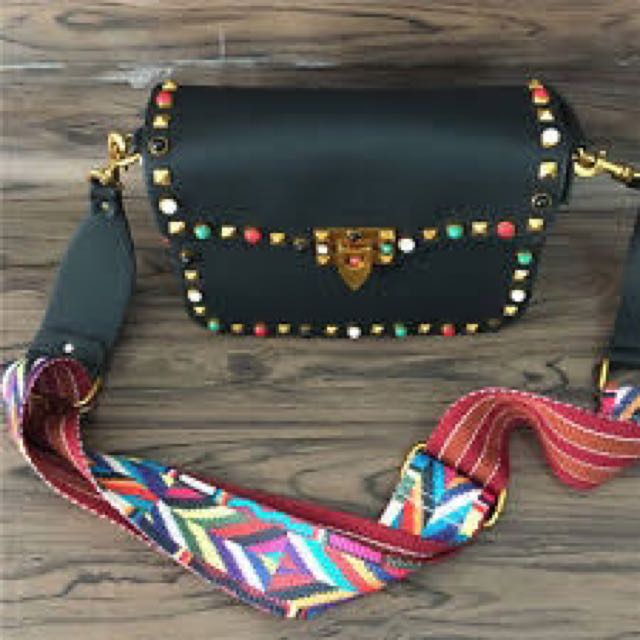 rockstud rolling crossbody bag