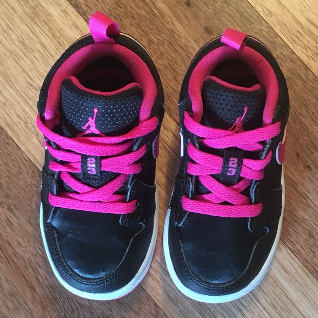 pink and black baby jordans