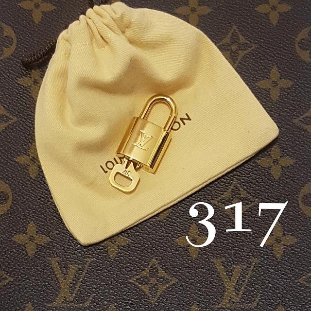SOLD* AUTHENTIC LOUIS VUITTON ORIGINAL Brass Lock with 1 Key Serial No #  317 GOLD Polished, Luxury, Accessories on Carousell
