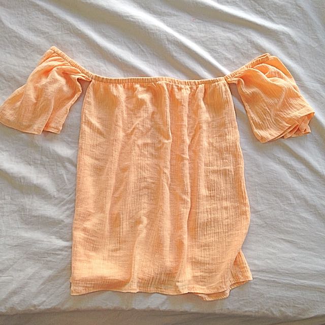 FREE SHIPPING TANGERINE OFFSHOULDER (Category: Sleeveless) located in Quezon City. Submitted by staples_ (Listing ID 117496394, Image 1). Description: .