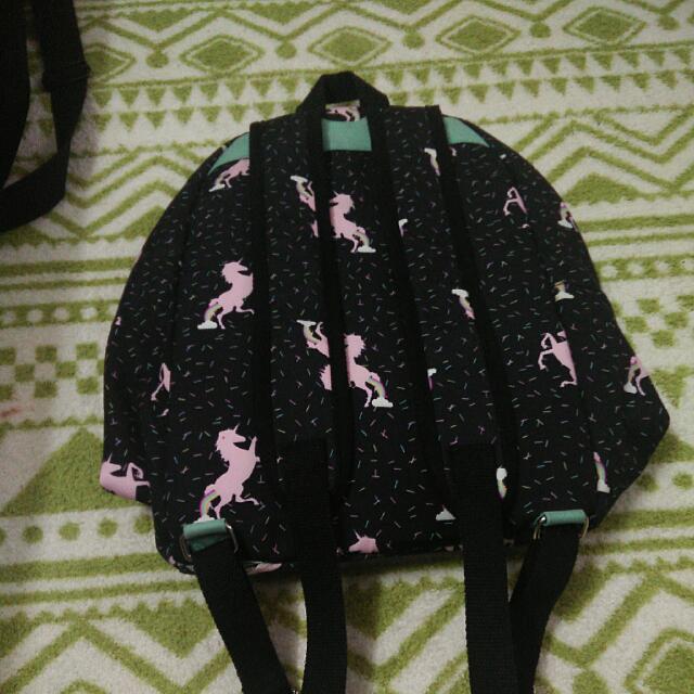 Typo unicorn backpack sales