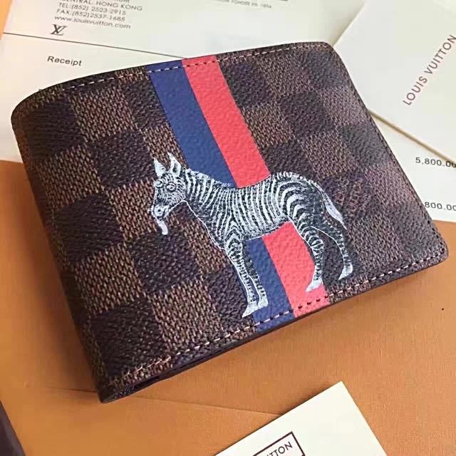 Louis Vuitton Chapman brothers zebra wallet, Luxury, Bags & Wallets on  Carousell