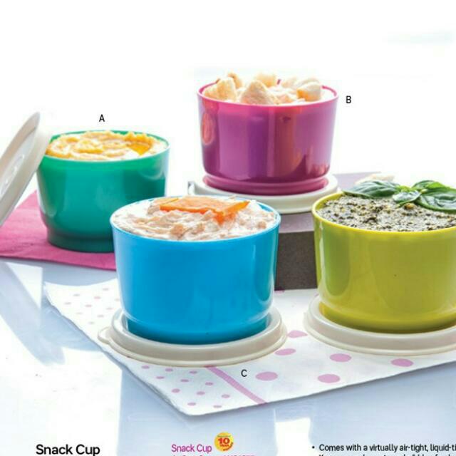 SALE!Snack Cup by Tupperware (Category: Dinnerware & Cutlery) located in Makati City. Submitted by plasticsnfrills (Listing ID 118162703, Image 1). Description: Tupperware Snack Cup With a virtually air-tight, liquid-tight seal. Keeps your desserts and nibbles fresh at home, in picnics, or outdoors. Ideal for single servings. Capacity: 130 ml each Dimensions: 8 cm D x5 cm H each Colors: sea green, fuschia kiss, sea water taffy(blue) margarita (ye