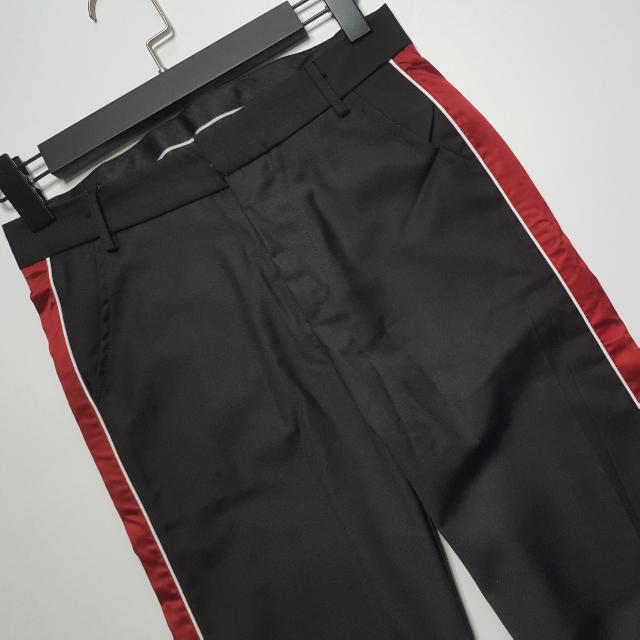 black pants with red side stripe