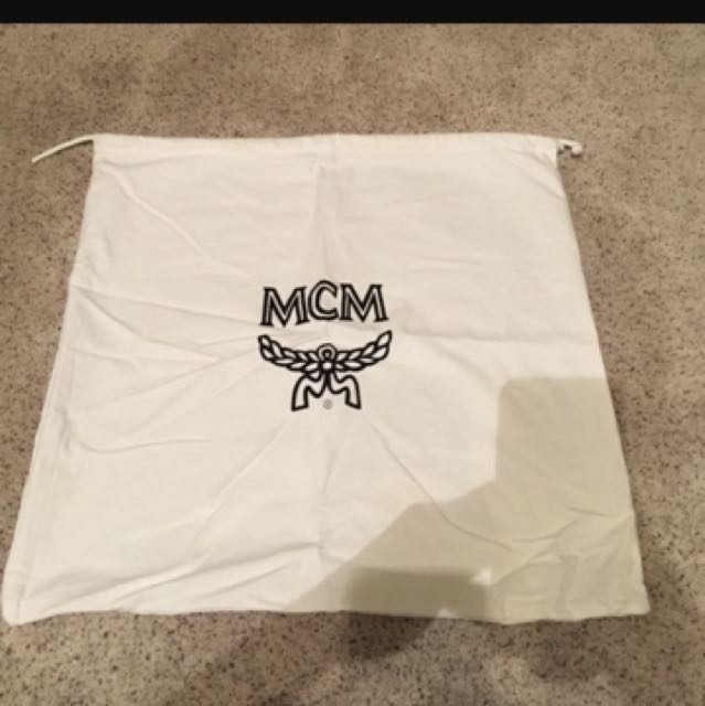 Mcm backpack deals dust bag