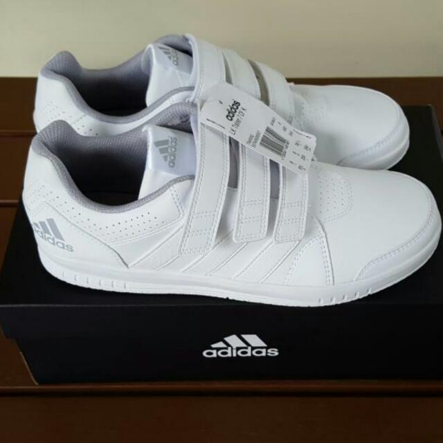 white adidas school shoes