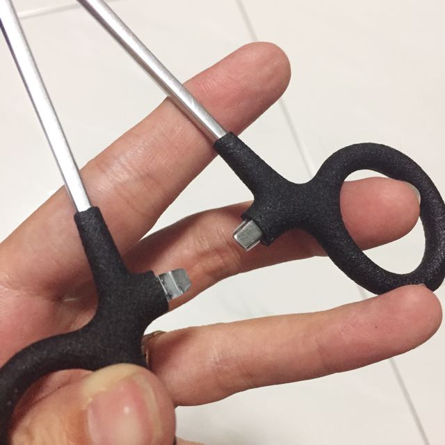 Dog ear best sale plucking forceps