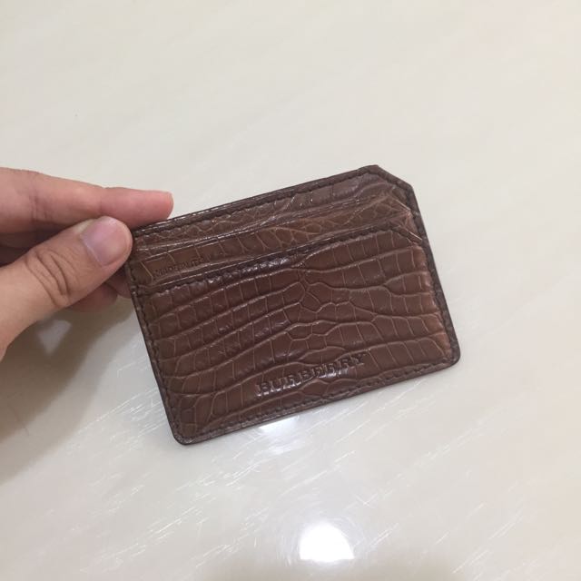 Second hand alligator skin authentic burberry card holder. Selling at 650. Original price 1 200