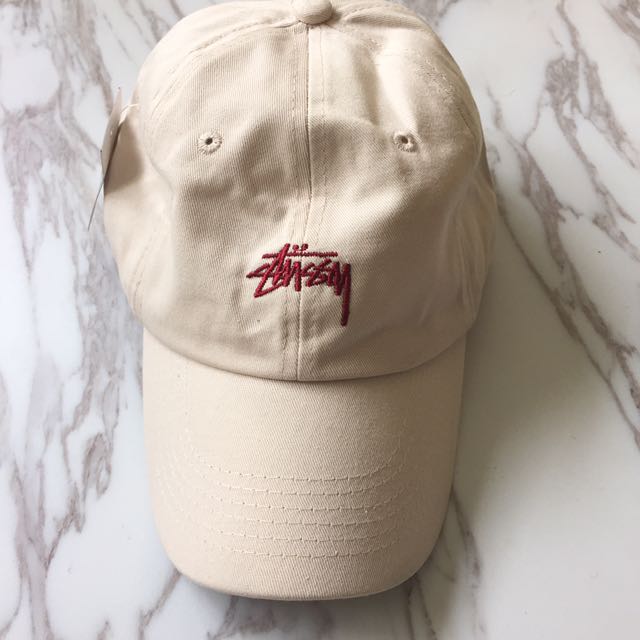 cream baseball cap