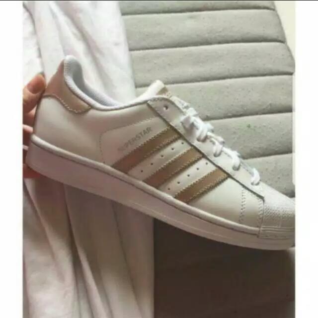 adidas with rose gold stripes