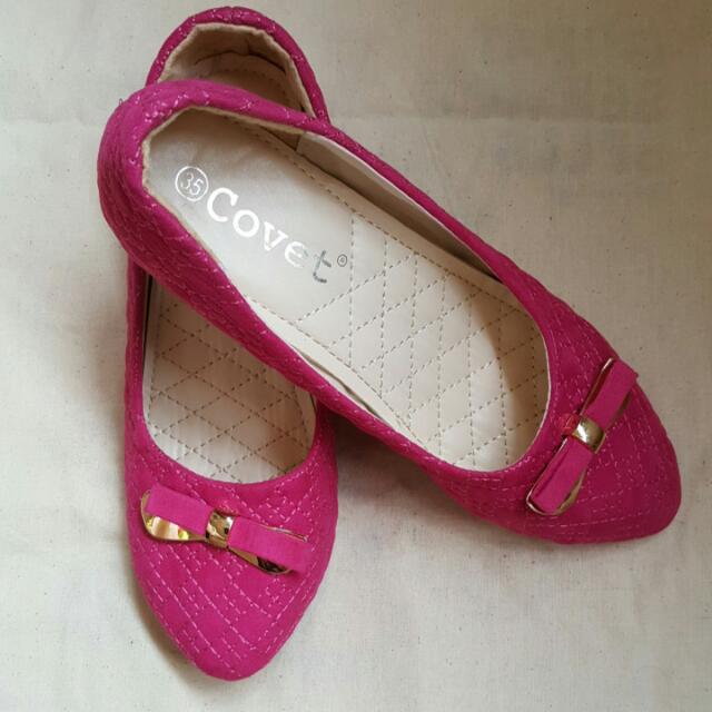 pink flat pumps