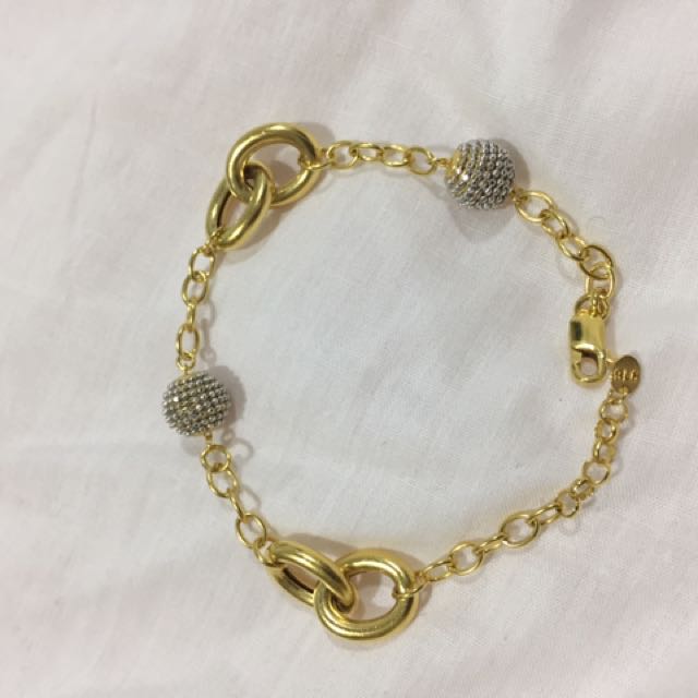 Tomei best sale gold bangle