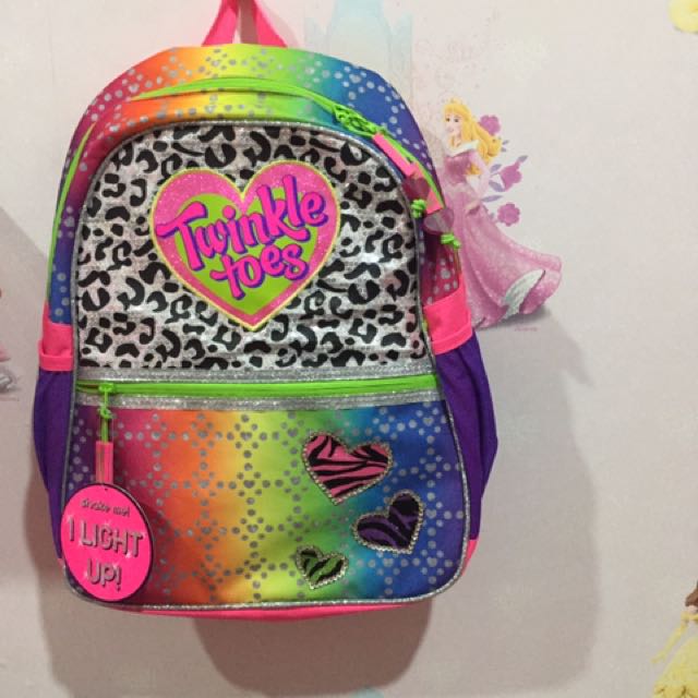 tas twinkle toes
