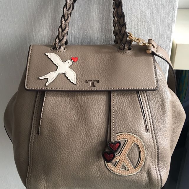 Limited Edition) Tory Burch Peace Embellished Half-Moon Small Satchel,  Luxury, Bags & Wallets on Carousell