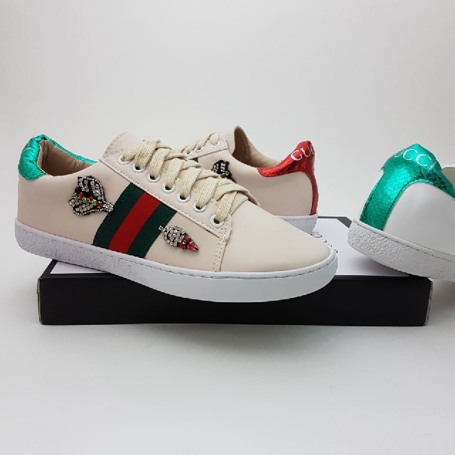 gucci trainers arrow