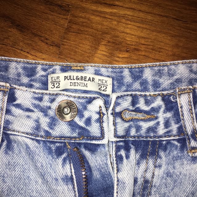 blue high waisted ripped mom jeans