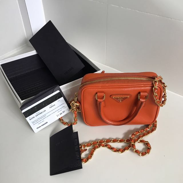 PRADA Nylon and Saffiano leather mini bag, Women's Fashion, Bags & Wallets,  Purses & Pouches on Carousell