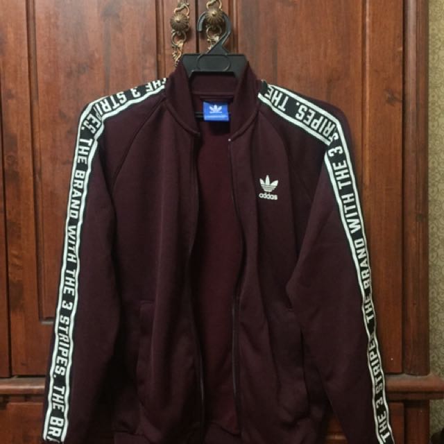 the brand with three stripes jacket