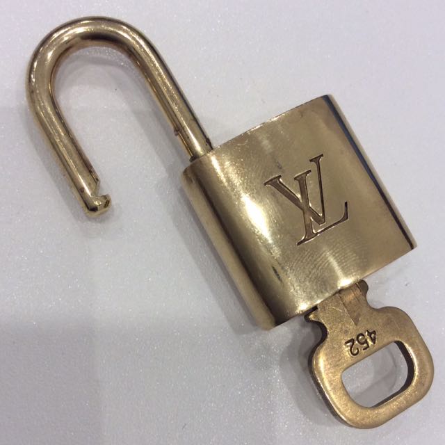 Revie - LV lock & key Condition 8/10 Number #452 Comes with only 1