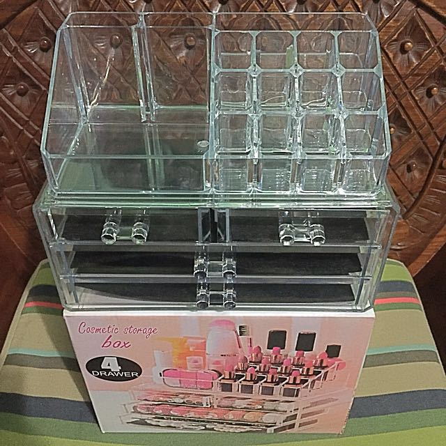 Acrylic Makeup Organizer/ Cosmetic Storage (Category: Makeup) located in Manila. Submitted by everythinchic (Listing ID 119518093, Image 1). Description: With 4 drawers Storage for cosmetics, jewelry, watches and other items. Different sizes grid design to better accommodate different cosmetics. It can be superimposed combination of crystal clear, waterproof wild fashion Environmental PS material (non toxic environmental protection, quality inspe