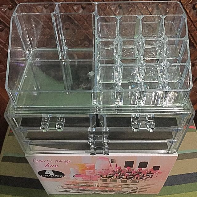 Acrylic Makeup Organizer/ Cosmetic Storage (Category: Makeup) located in Manila. Submitted by everythinchic (Listing ID 119518093, Image 2). Description: With 4 drawers Storage for cosmetics, jewelry, watches and other items. Different sizes grid design to better accommodate different cosmetics. It can be superimposed combination of crystal clear, waterproof wild fashion Environmental PS material (non toxic environmental protection, quality inspe