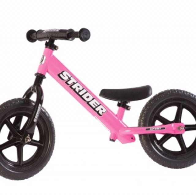 strider balance bike pink