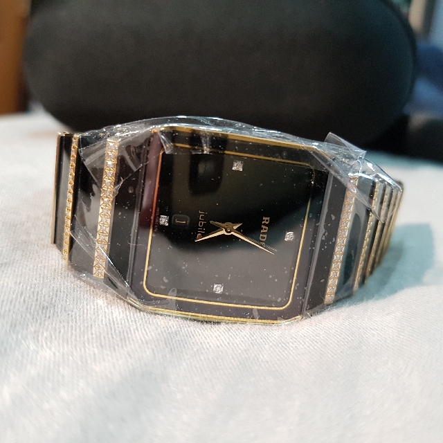 Rado jubile 18k gold and jewel top