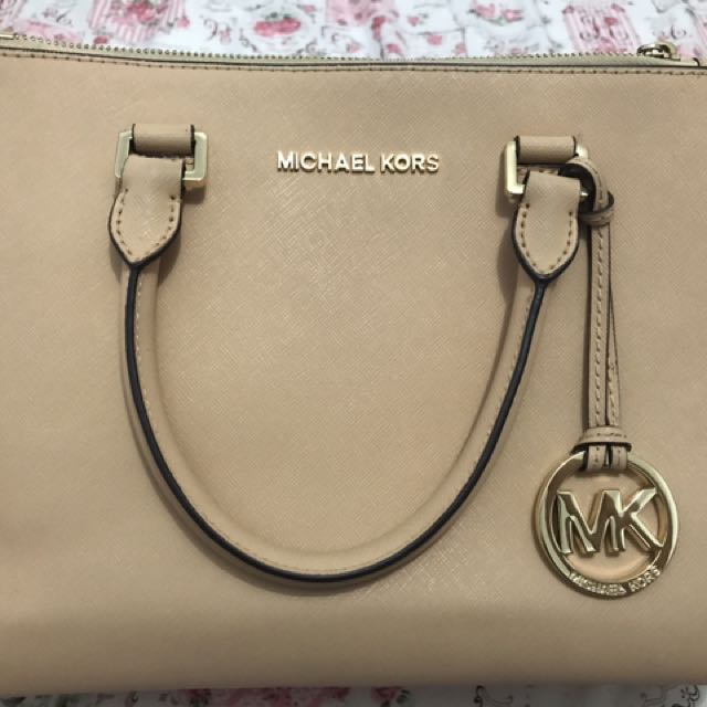 blush colored michael kors bag