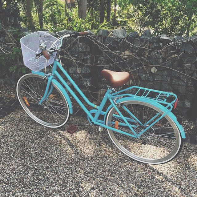 vintage blue bike with basket