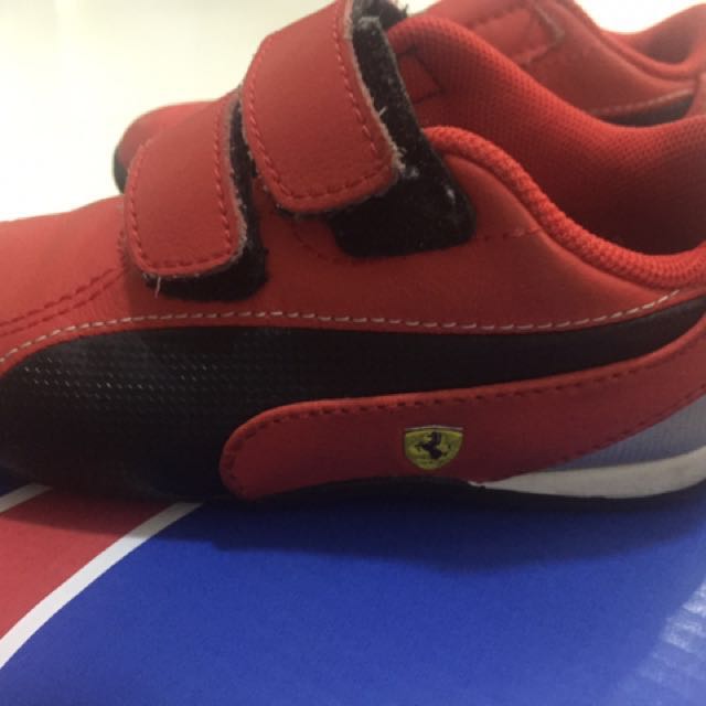 puma red sports shoes