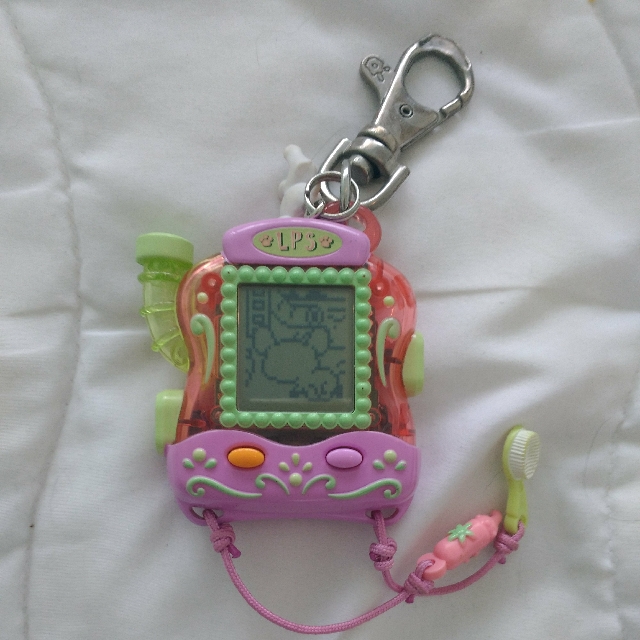 Littlest Pet Shop Tamagotchi like Pocket Toy (Category: Toys) located in Toronto. Submitted by username4 (Listing ID 126092362, Image 1). Description: .